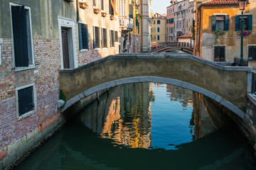 Fototapeta na wymiar Bridges on the canal of Venice, Italy.