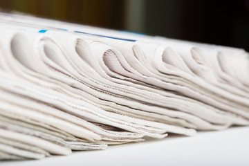 Folded newspapers