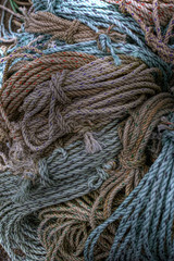 Colorful coils of rope on a pier