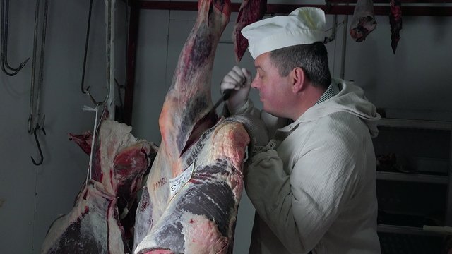 butcher in his cold room