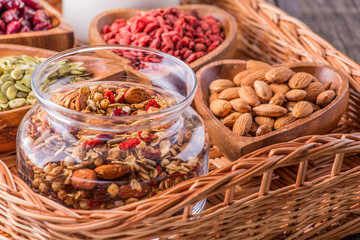 Homemade granola with milk, berries, seeds and nuts
