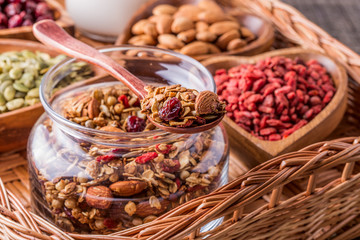 Homemade granola with milk, berries, seeds and nuts