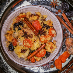 Traditional moroccan chicken with dried fruits and spices.