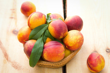 Nectarines on wooden table