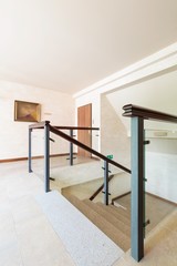 Stylish staircase with glass railing