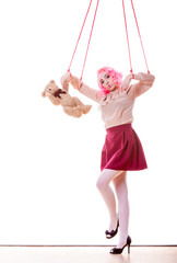 woman girl stylized like marionette puppet on string