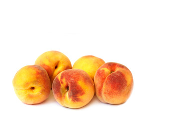Juicy peaches on white background
