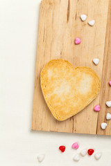 Valentines Day heart shaped cookies ready to decorate. Selective focus.
