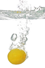lemon falls into the water