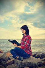 hipster girl reading a book