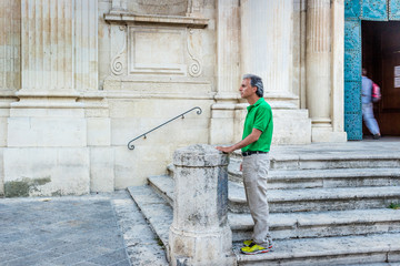 adult among the palaces of Lecce Baroque