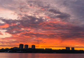 dramatic evening sunset of Moscow skyline across the Volga River 