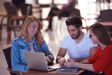 students group working on school  project  together