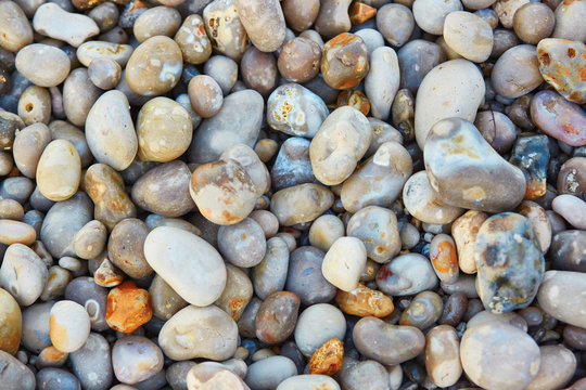 Many colorful pebbles on the beach