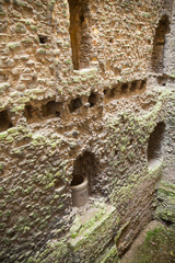 ROCHESTER, UK - MAY 16, 2015: Rochester Castle 12th-century. Inside view of castle's ruined palace walls and fortifications