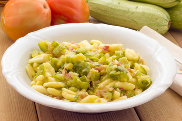 Cavatelli pasta with bacon and courgettes