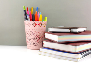 colorful holder full of pen and pencil office equipment for eduation or business still life