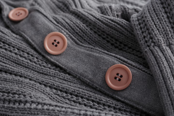 Knit sweater closeup button