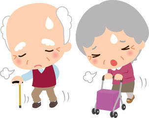 苦労して歩くシニアの男女