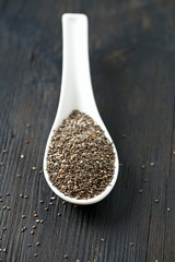 chia seeds on wooden surface