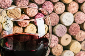 wine corks through a glass of red wine