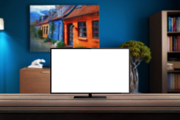 isolated tv on wooden desk in room background for mock up presentation