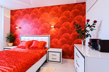 Comfortable bedroom in red and white