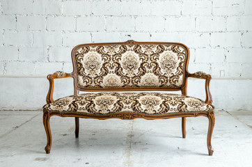 Luxurious classical vintage sofa on white background