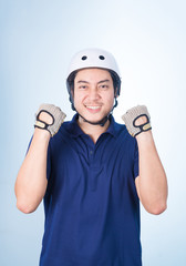 Asian guy with bicycle helmet and gloves