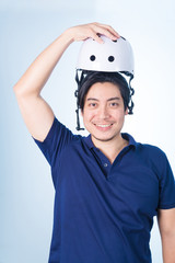 Asian guy with bicycle helmet and gloves
