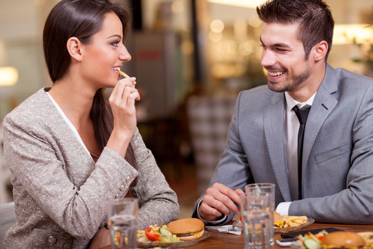 Business couple enjoy in lunch at restaurant