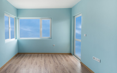 Empty blue room with windows and a door (includes clipping path)