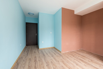 Empty blue room with windows and a door (includes clipping path)