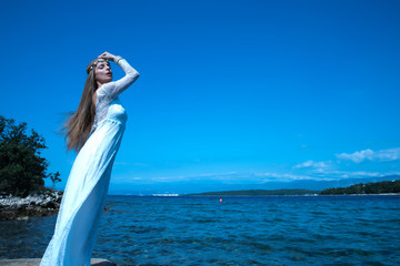 Princess of the night at the ocean.