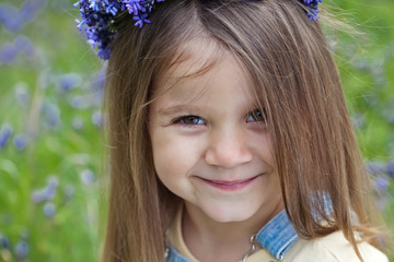 Happy little girl in nature 