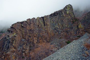road and mountain in the fog