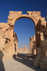 Monumental arch in the eastern section of Palmyra's colonnade, Palmyra, Syria