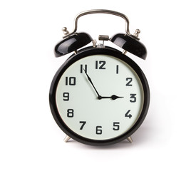 Iconic alarm clock isolated on white