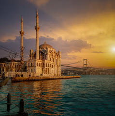 Fototapeta na wymiar Iconic view of Istanbul from Ortakoy with The Bridge, The Mosque and The Bosphorus