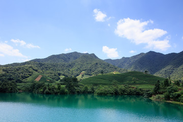Fototapeta na wymiar clear lake surrounded by mountains