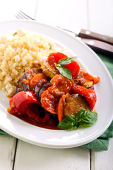 ratatouille with sauce on plate