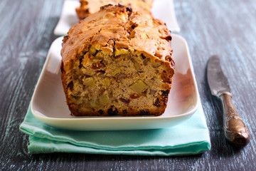 Apple and walnut teabread on plate, selective focus