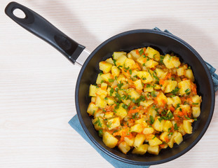 stewed potatoes in a frying pan