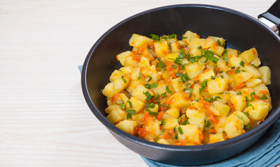 stewed potatoes in a frying pan