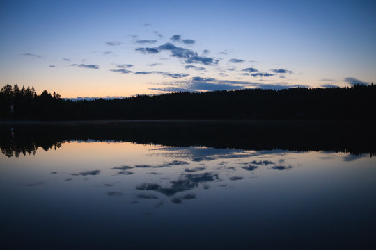 Calm lake scape at summer night