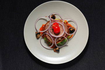 portion served in a restaurant decorated with lettuce
