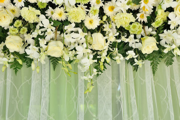 Green and white backdrop flowers arrangement