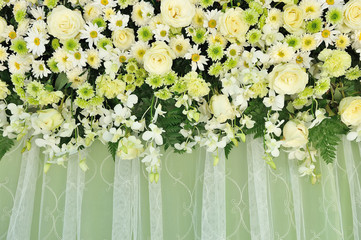 Green and white backdrop flowers arrangement