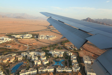 Fototapeta na wymiar view from the airplane desert mountains