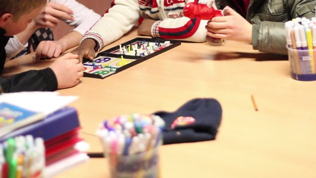 Kids playing social game and a problematic one alone